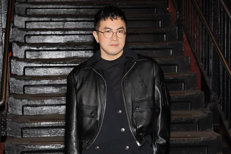 Bowen Yang attends the CHANEL 2025/26 Métiers d’art fashion show at Bowery subway station, Tuesday, Dec. 2, 2025, in New York. (Photo by CJ Rivera/Invision/AP)