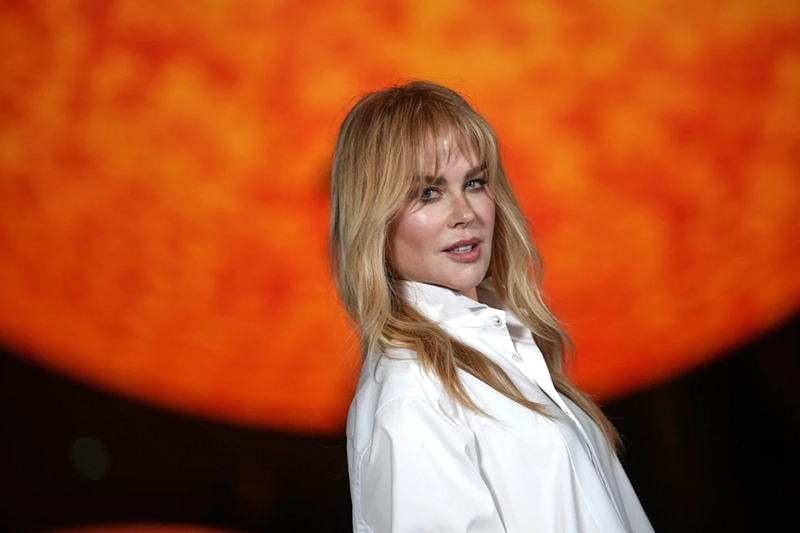 Nicole Kidman poses for photographers upon arrival at the Chanel Spring/Summer 2026 collection presented in Paris, Monday, Oct. 6, 2025. (AP Photo/Christophe Ena, File)
