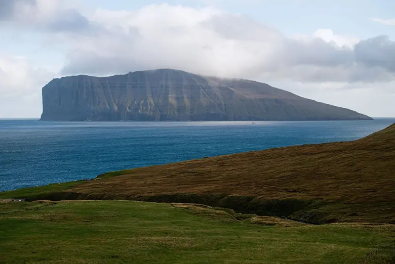 The Fugloy Island is pictured from the Vidoy Island, on October 10, 2021, near Vidareidi village in the Faroe Islands. (Photo by Jonathan NACKSTRAND / AFP) (Photo by JONATHAN NACKSTRAND/AFP via Getty Images)