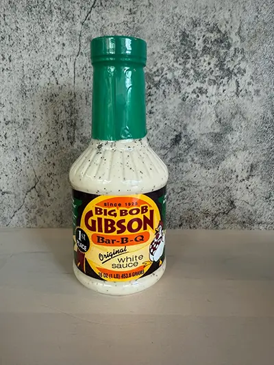 A bottle of Big Bob Gibson Original White sauce is displayed in New York. (Katie Workman via AP)