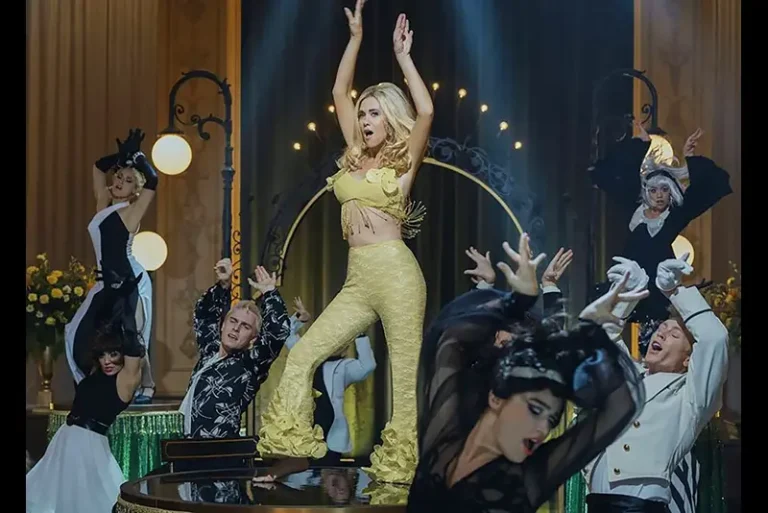 This image released by Apple TV shows Kristen Wiig in a scene from &ldquo;Palm Royale.&rdquo; (Erica Parise/Apple TV via AP)