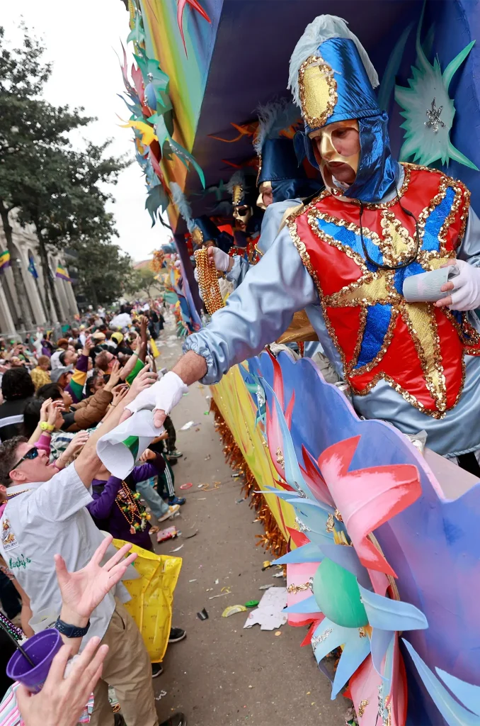 NEW ORLEANS, LOUISIANA - MARCH 4: Float riders toss throws to the crowd as the Rex parade rolls down St. Charles Avenue on March 4, 2025 in New Orleans, Louisiana. (Photo by Michael DeMocker/Getty Images)