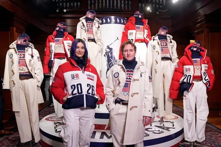 Snowboarders Brenna Huckaby, left, and Red Gerard unveil Ralph Lauren’s Team USA closing and opening ceremony uniforms for the 2026 Milan Cortina Winter Olympics at Ralph Lauren headquarters, Wednesday, Dec. 3, 2025, in New York. (Photo by Charles Sykes/Invision/AP)
